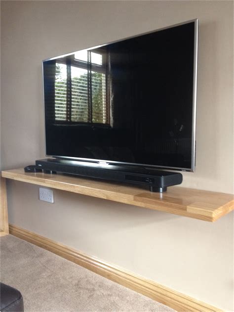 floating wall mount tv|mounted tv with floating shelves.